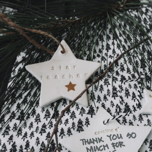 Ceramic Christmas Star Ornament gold 'star teacher' in cotton bag